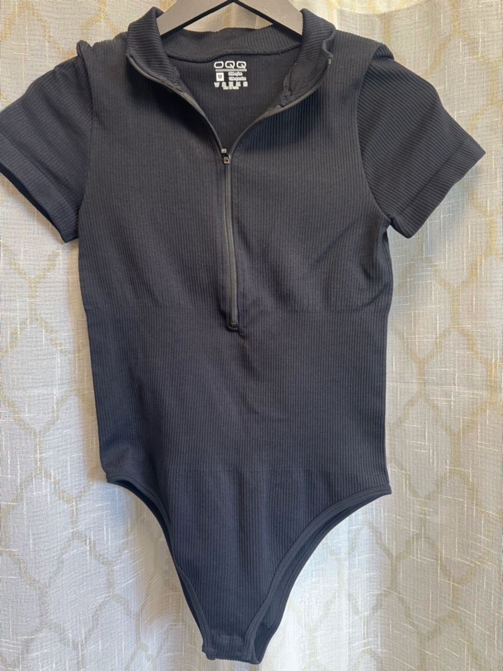 OQQ Black Ribbed Zip-Front BODYSUIT